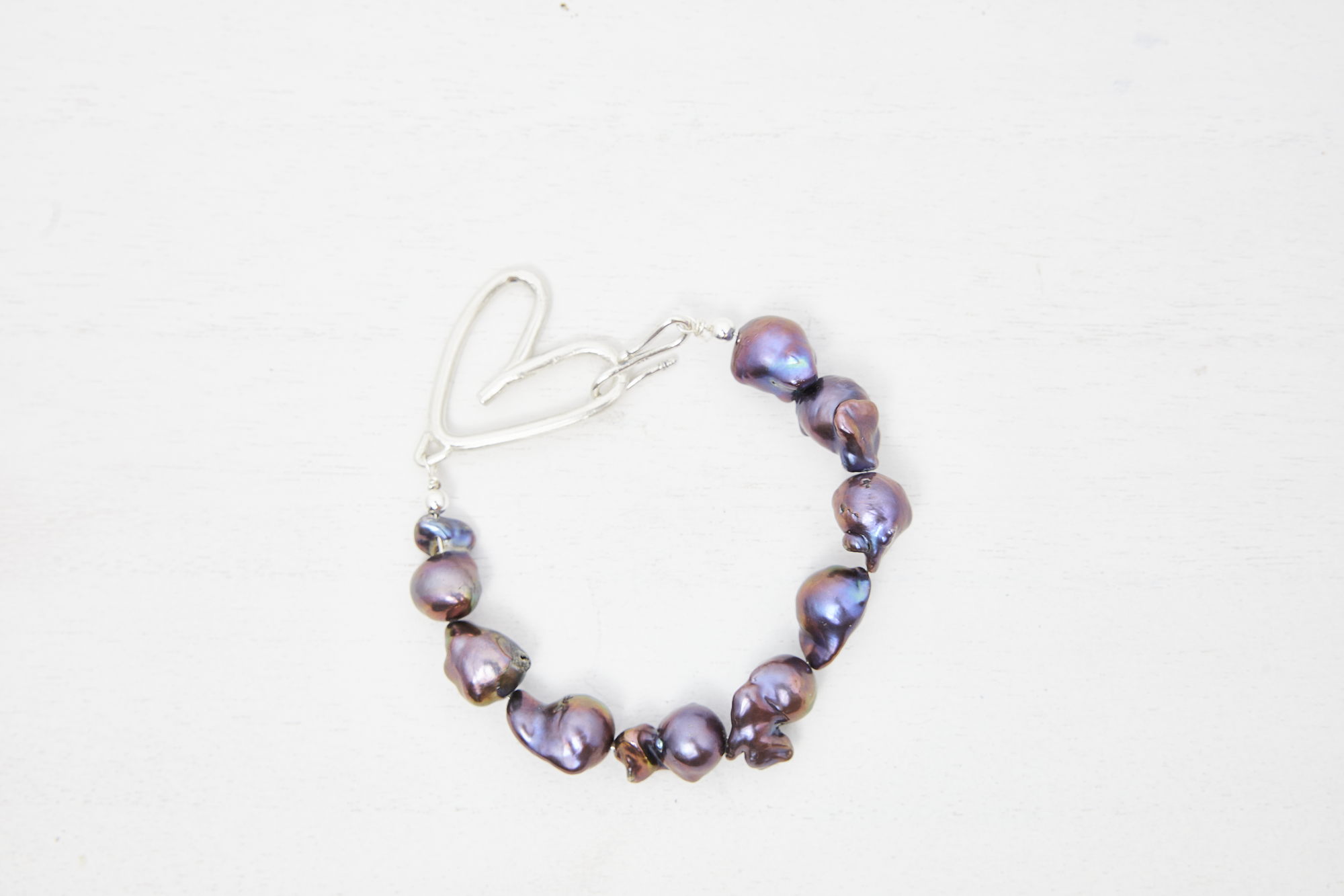 Tia peacock baroque pearl bracelet handcrafted with heart shaped closure made in new york city