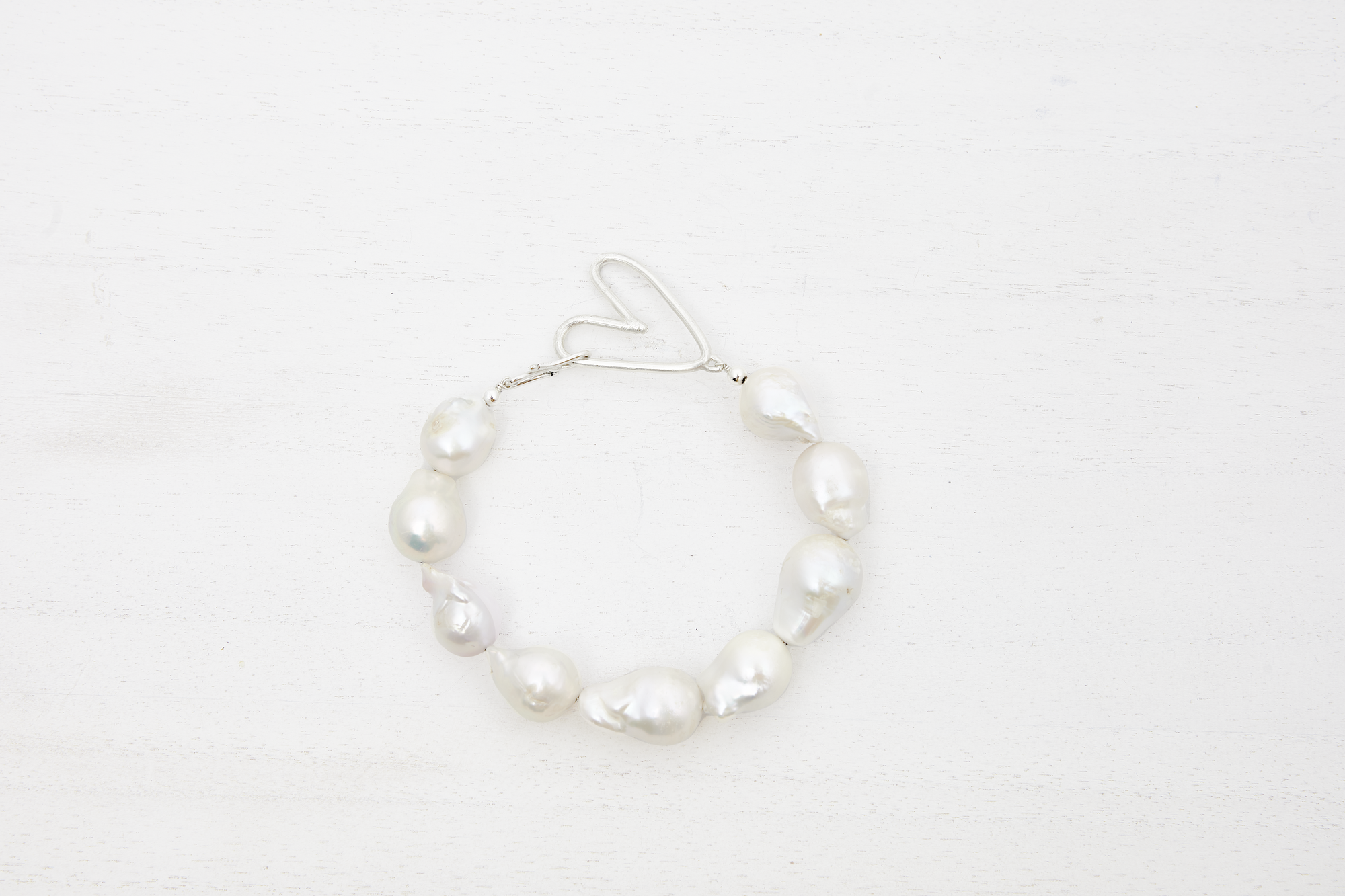 Elisa White Baroque Pearl Bracelet
handcrafted with 935 Argentium silver made in New York City
